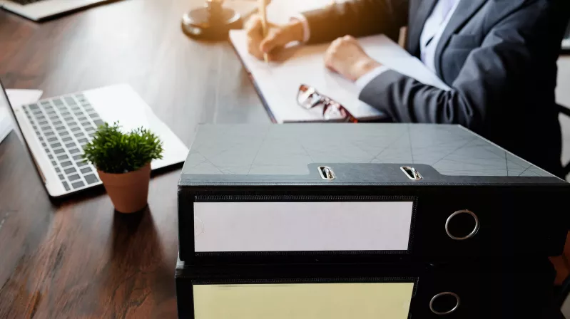 image of man at a desk